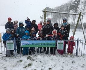 Snowy grand opening for new playground near Fairways development